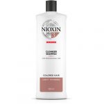 Dầu gội Nioxin 3 - 1000ml làm sạch, ngăn ngừa rụng dành cho tóc nhuộm và có dấu hiệu thưa rụng nhẹ.